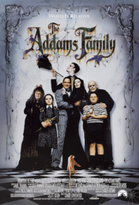 The Addams Family poster, seven pale people looking scary.