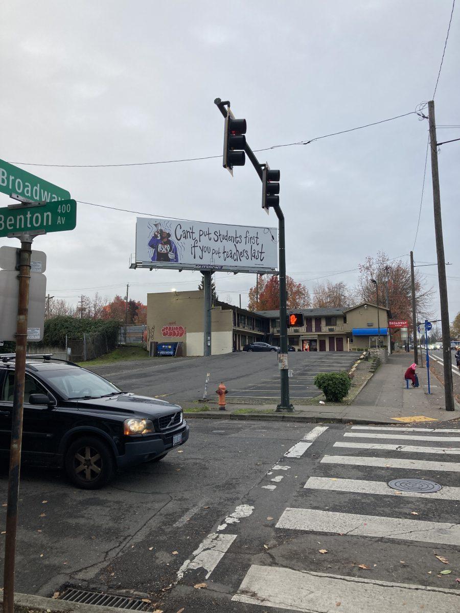 A PAT-sponsored billboard on Broadway that says “Can’t put students first if you put teachers last".