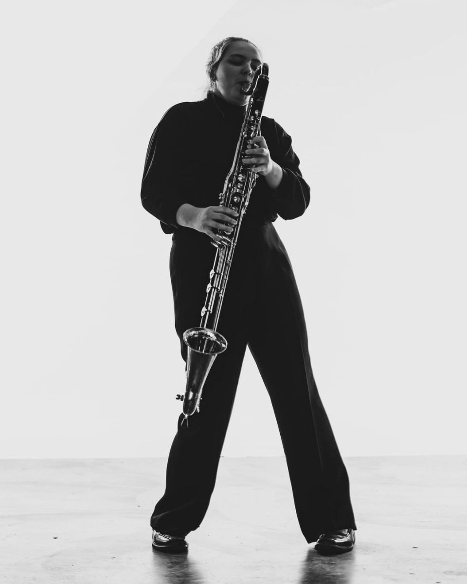 Mari Baker playing her bass clarinet.
