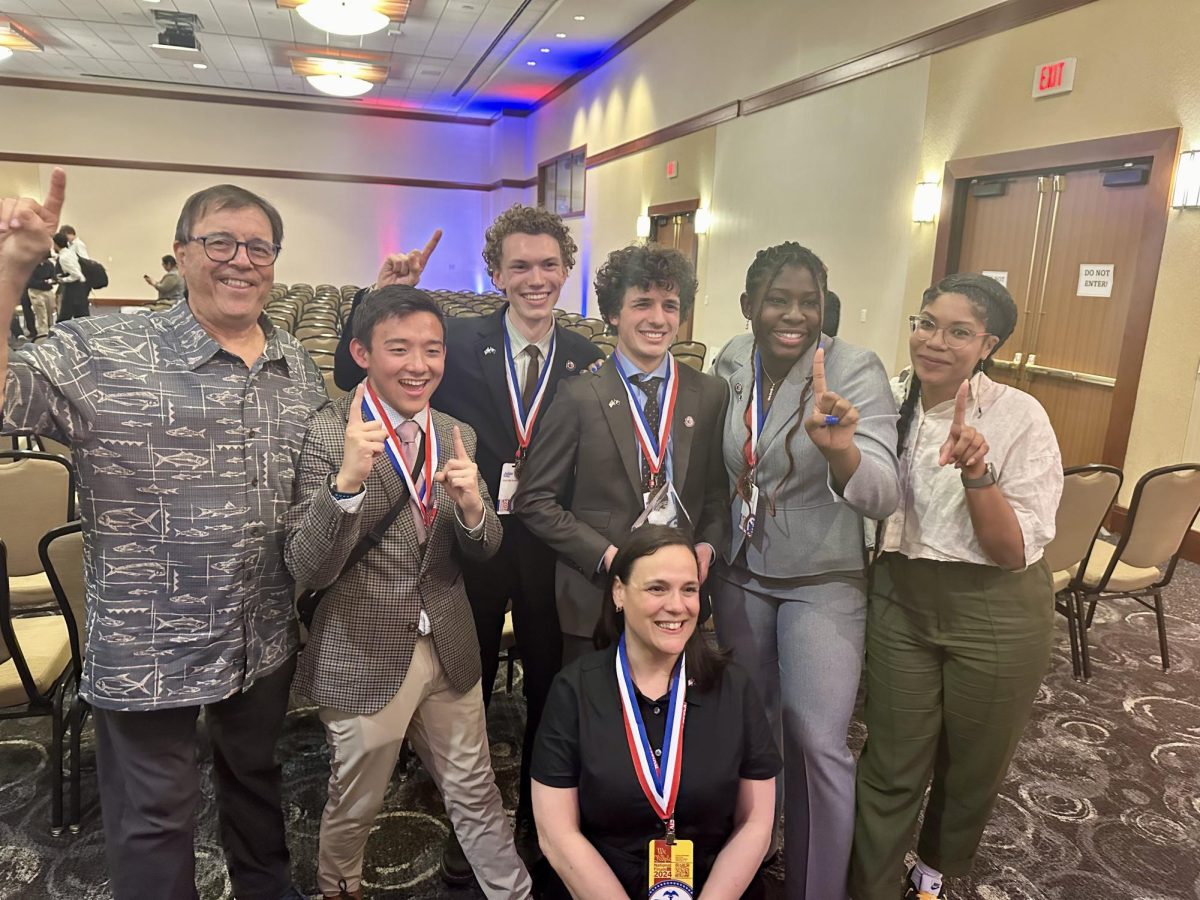 Unit Five members with their coaches, Al Karpinkski and Adrienne Anderson, and their teacher, Angela DiPasquale.