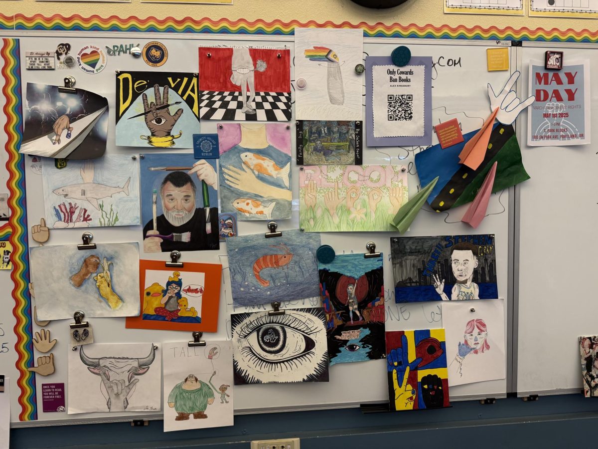 Art made by Grant High School American Sign Language students, inspired by the Deaf View/Image Art (De'VIA) movement, is showcased on the walls of the American Sign Language classroom.