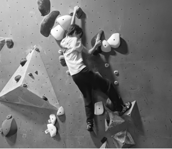 Braeden Roark, a Grant High School student, climbing at The Circuit Bouldering Gym.