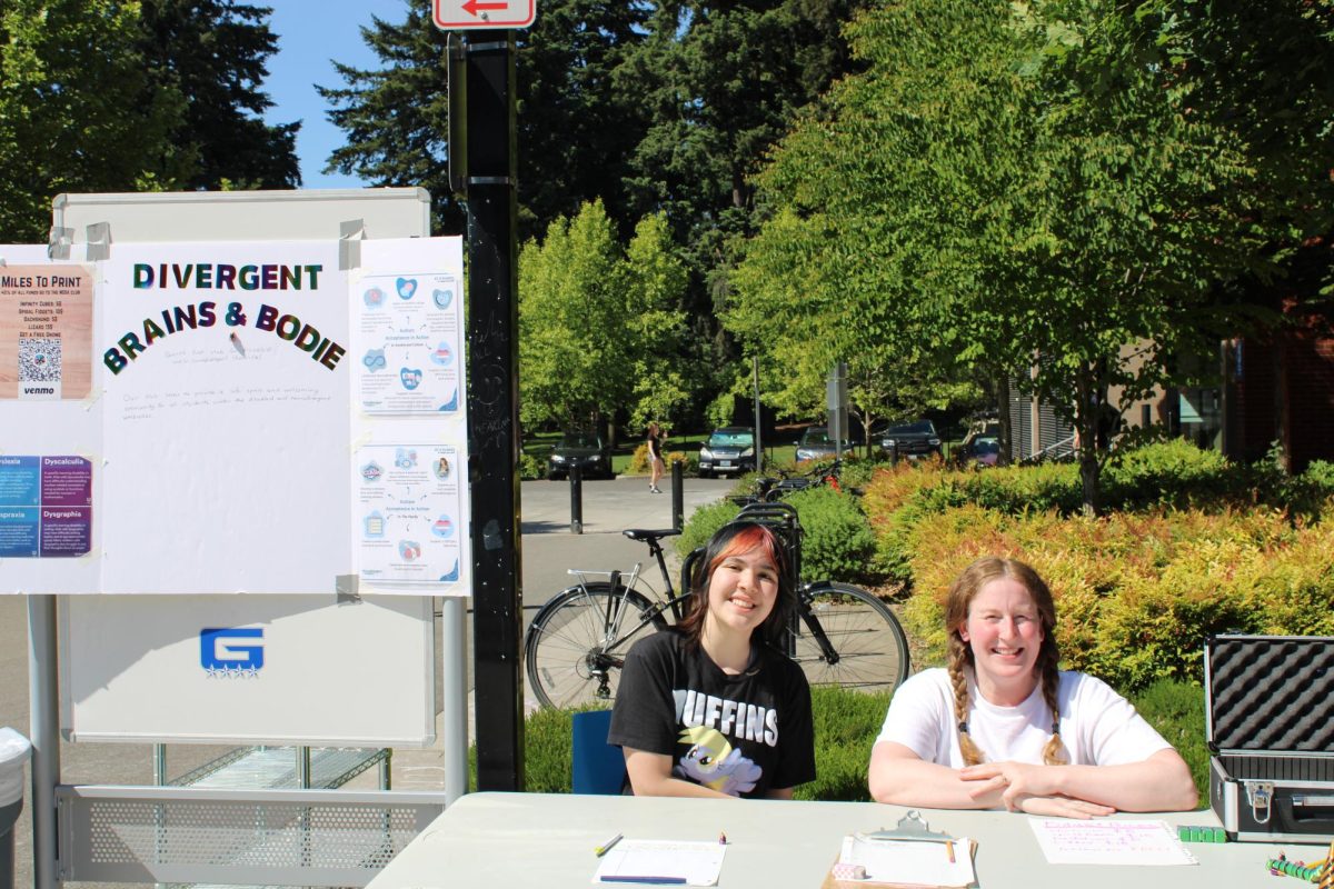 Virginia Kiel runs a booth with Grant student Micah Saladini during the Cultural Kickback, a lively celebration of diversity at Grant. Saladini's recent involvement in Grant's neurodivergent community is a success story of Neurodiversity Week, and together the two are working to further honor neurodivergent minds in our community at the end of the school day on May 22.